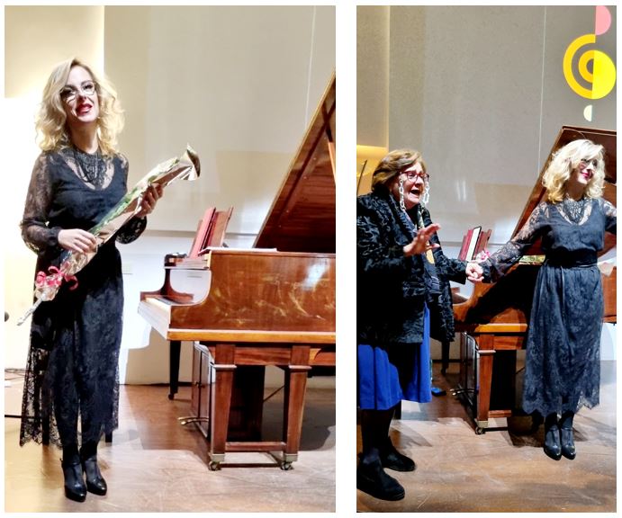 Maggie Lorelli with a Flower and talking to a relative of one of the other composers
