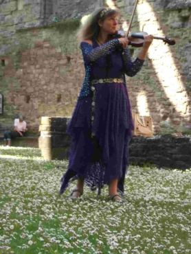 Fiona fiddling in Tintern Abbey 2014